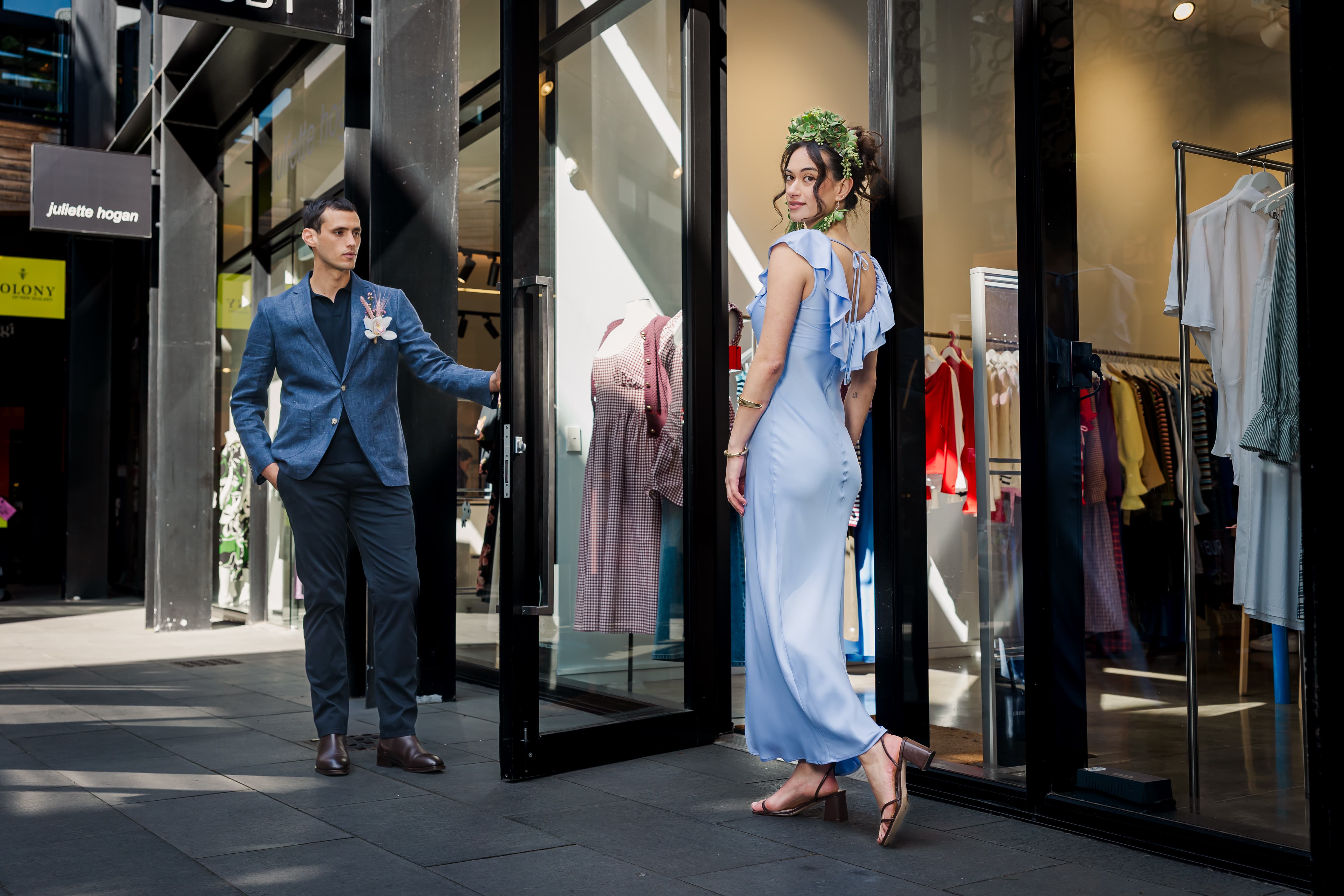 Chivalry’s Not Dead. Juan holds the door in a Rodd & Gunn knit, jacket, pants and boots. Natural boutonniere by Thoisle & Co.